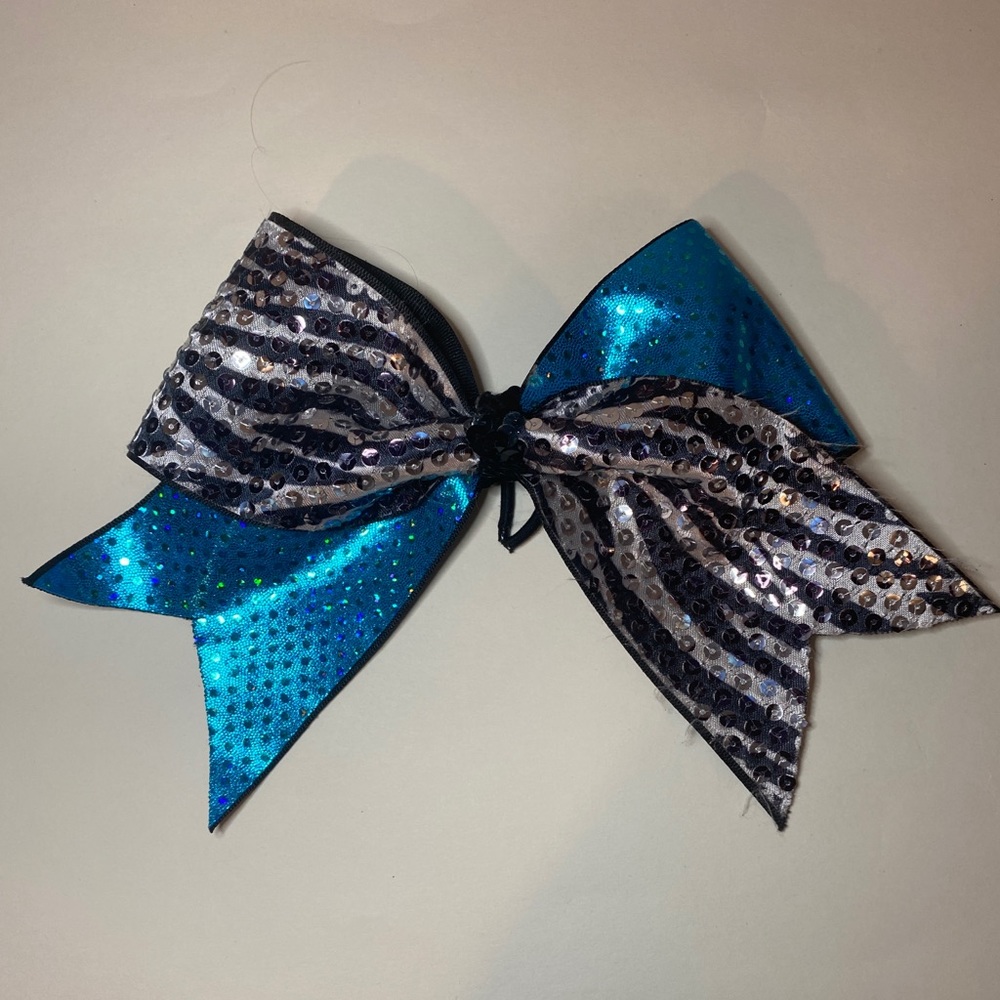 Teal cheer bow with zebra stripes